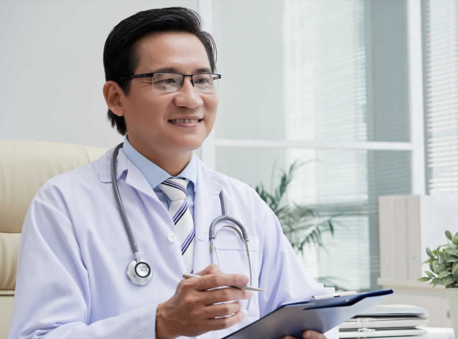 A doctor reviewing a laboratory report