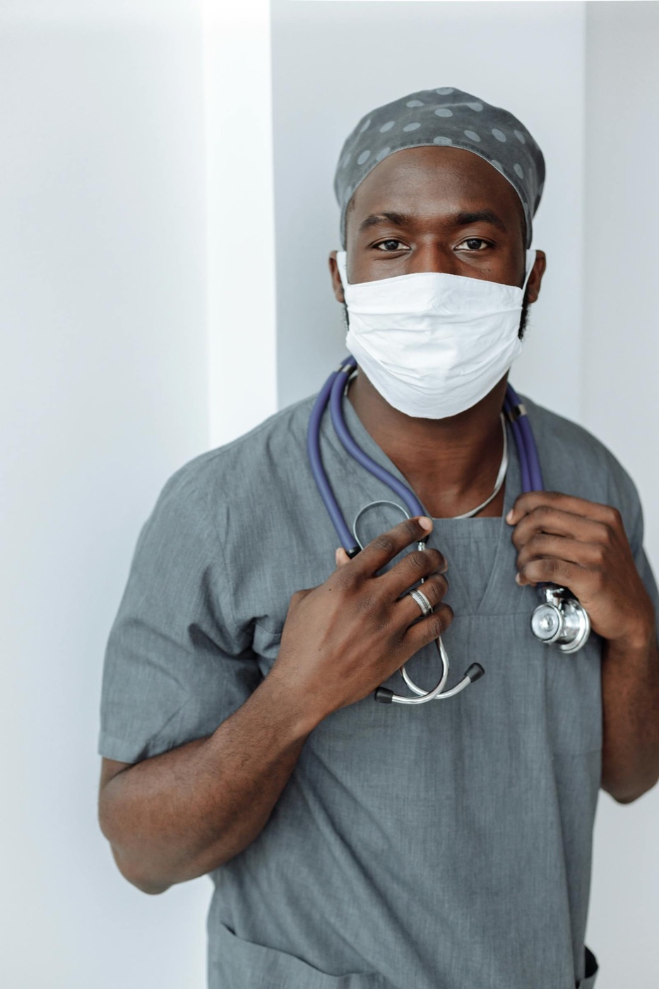 A clinician in scrubs